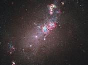 Hubble scrute détail nébuleuses dans galaxie naine 4214